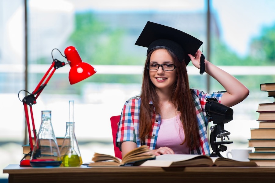 female student preparing chemist